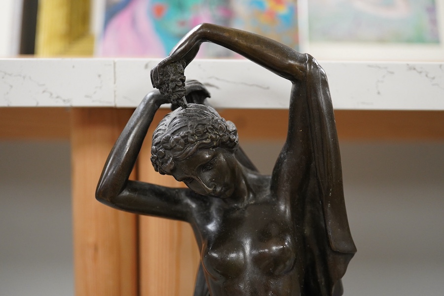 A 20th century bronze figure of a maiden, raised on marble socle, 38.5cm. Condition - fair to good